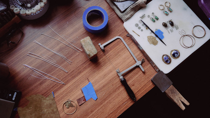 Juliana Yasmine in her studio, designing handcrafted jewelry.